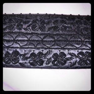 Hand beaded clutch